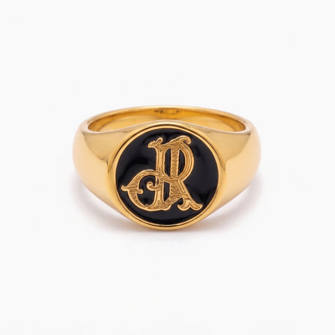 Klackring med sammanflätat monogram