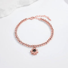 Individuell gestaltetes Sonnenblumenarmband mit Fotoprojektion