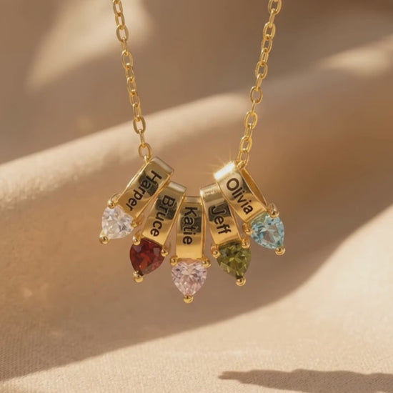 Personalized mothers necklace with engraved name rings and heart birthstones